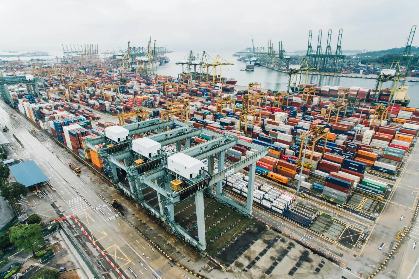 Freight terminal with stacked shipping containers